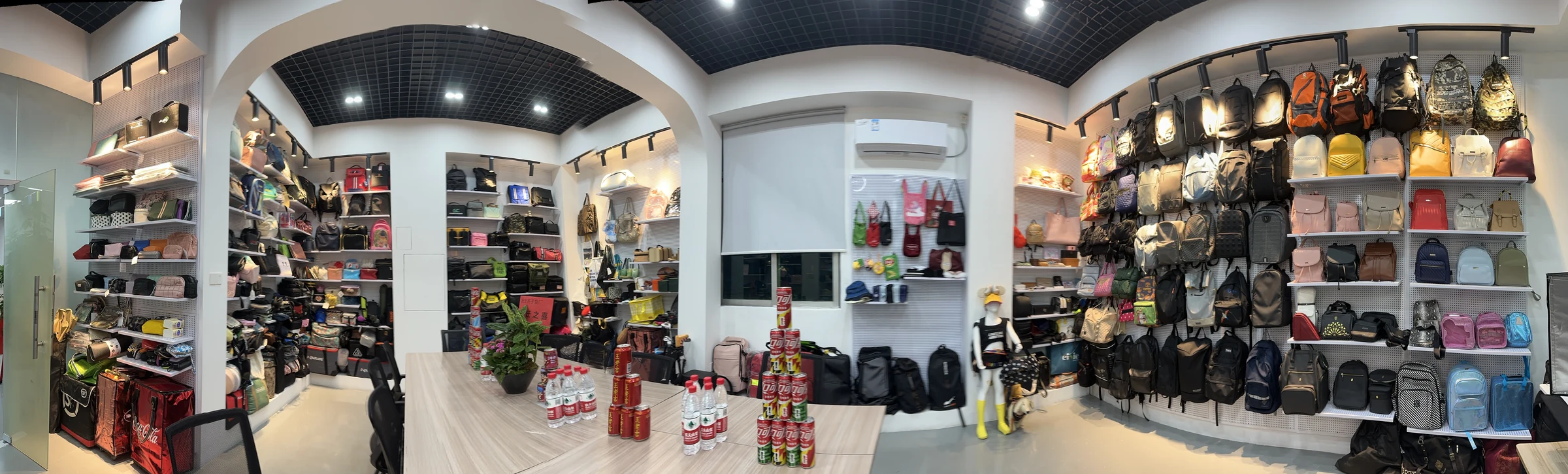 Finished sample showroom Real Hongzhao sample showroom displaying completed backpacks, handbags and promotional bags
