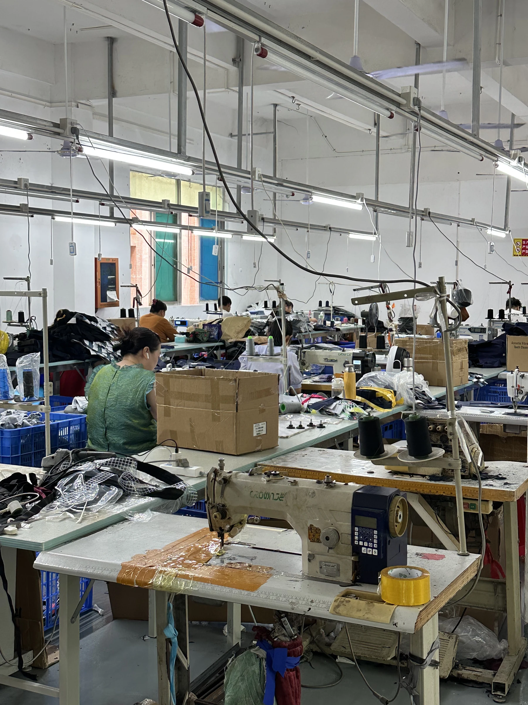 Inside the sewing workshop Real Hongzhao custom bag sewing workshop in Shenzhen with operators and industrial sewing machines